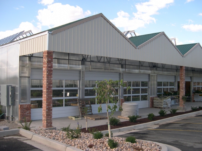Garden center with row of overhead doors for easy access.
