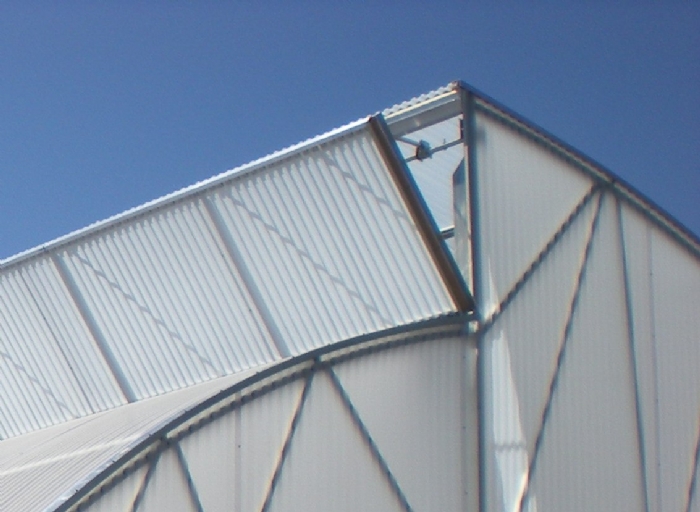 Close-up of Zephyr Atrium Vent opening outward from bottom