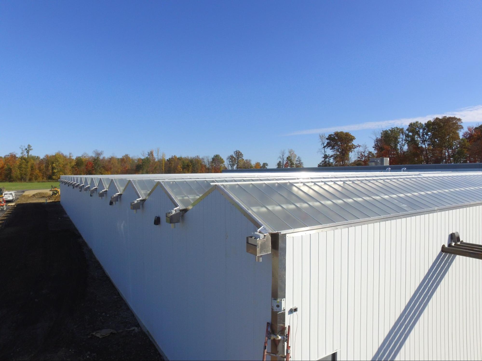 a shot from above of a Cannabis Greenhouse by Prospiant