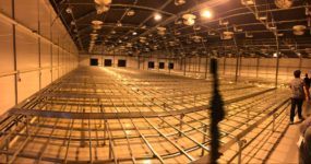a shot of the inside of a Blackout Cannabis greenhouse in the process of development