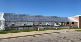 MSU plant science greenhouse with new roof covering.