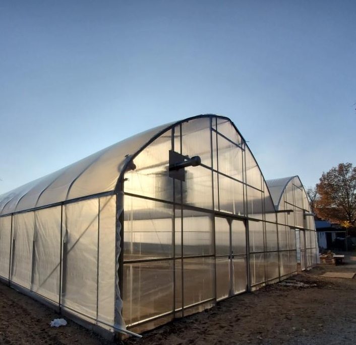 Example of Windjammer stand-alone greenhouse with no gutter connection