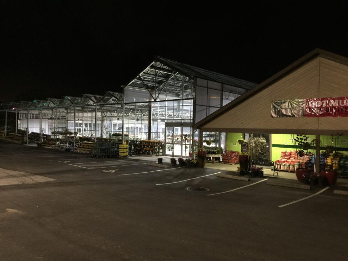 Nighttime shot of White Oak Gardens Open-Roof, 11,138 square foot retail greenhouse