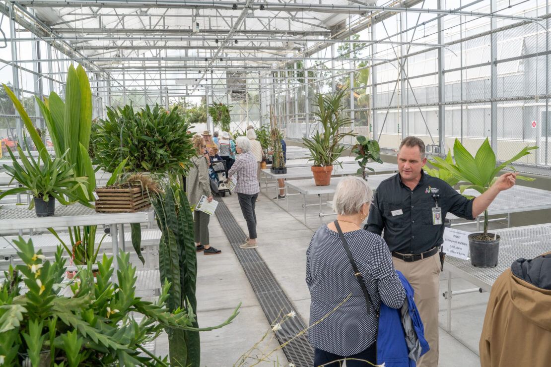 Guests view the new greenhouses at the Evenstad Horticulture Campus during a dedication ceremony.