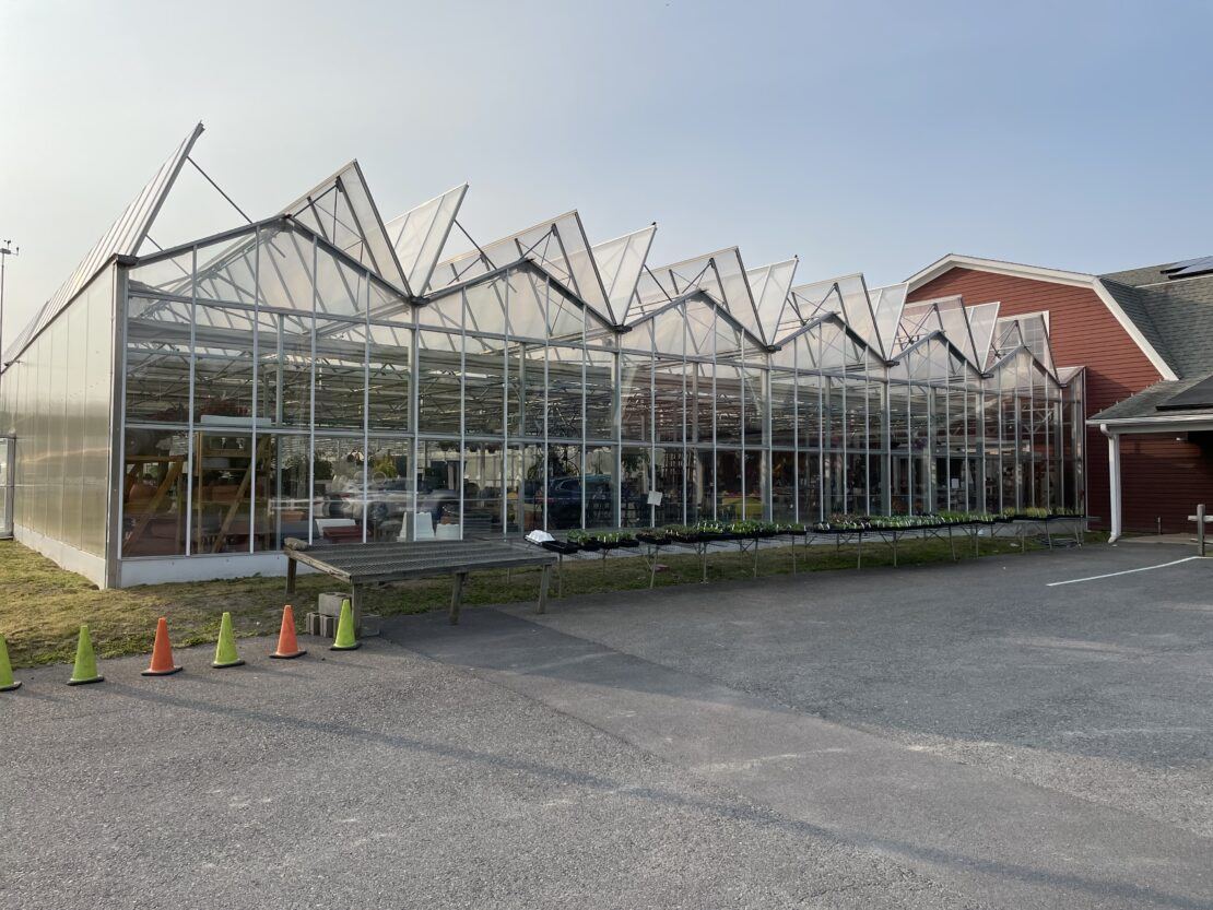 Open Roof greenhouse_retail setting - Prospiant Open Roof or Retractable Roof greenhouses are ideal for retail or production settings.