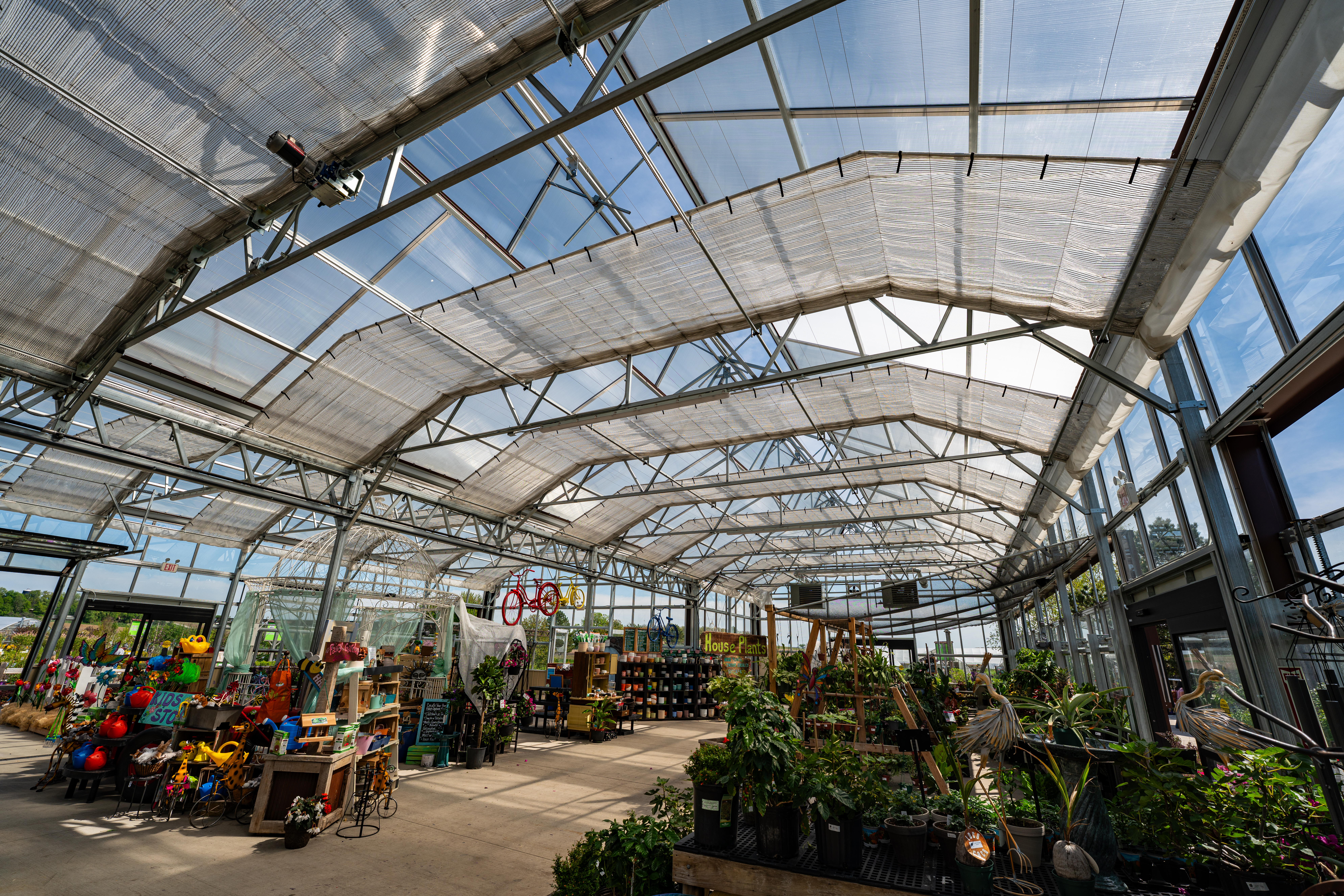 Screens for Greenhouses: Interior Shade and Energy Curtains