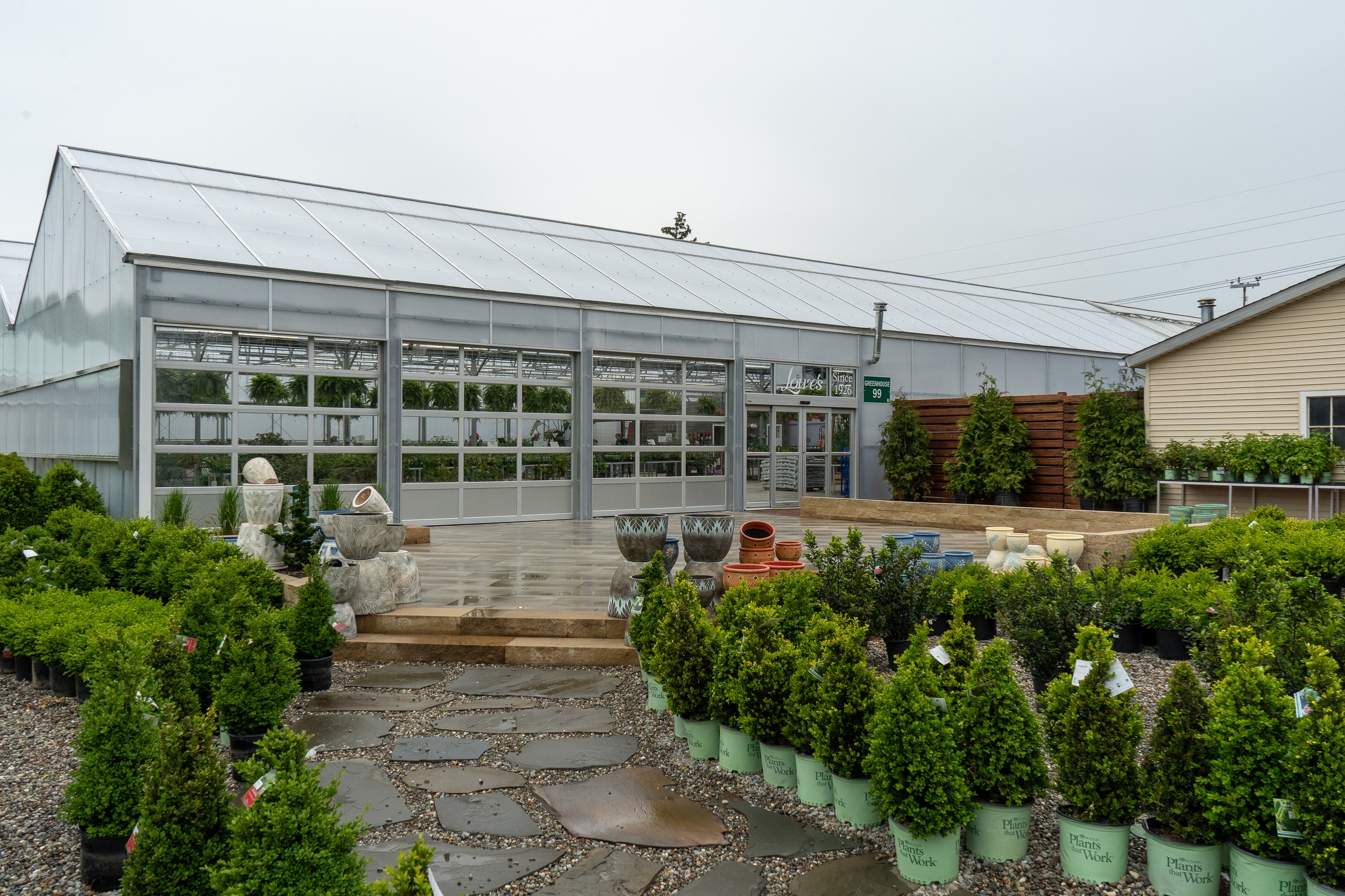 Three overhead doors open Greenhouse 99 to a gorgeous patio for events.