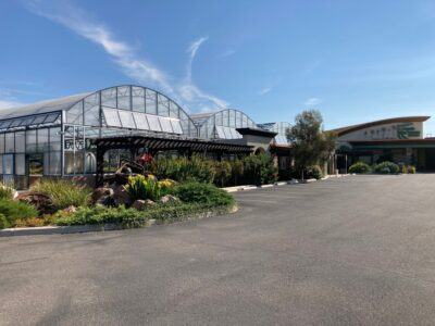 Ladder bar trusses used on a Grand Teton greenhouse give it a stand out appearance with lots of curb appeal.