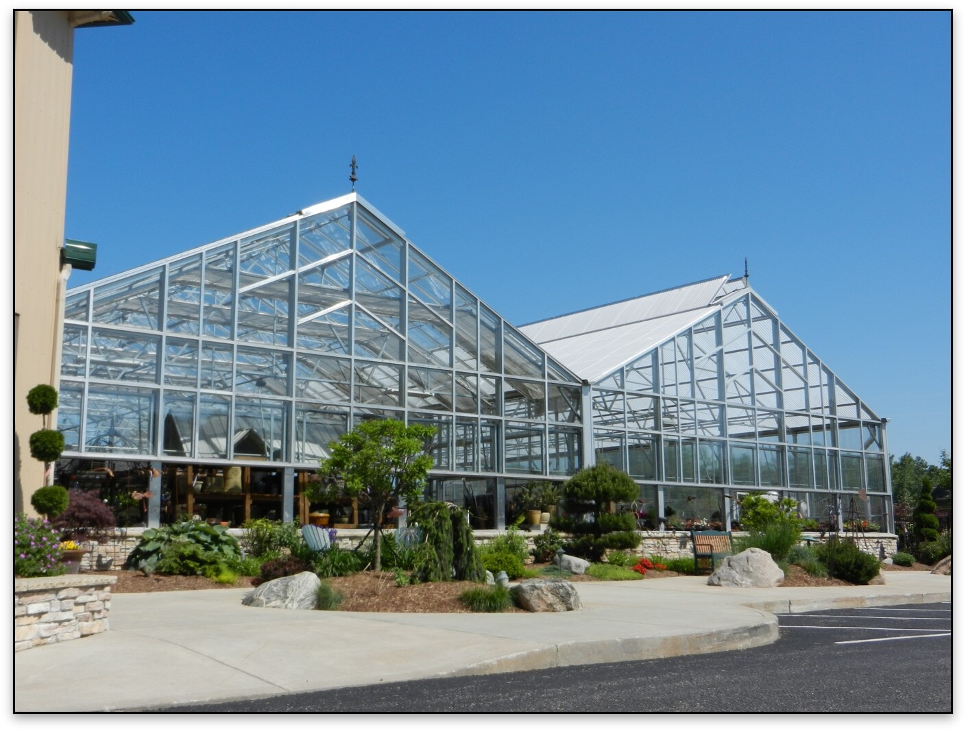 Clear view truss framing on retail greenhouses hides the trusses webbing on the front for a cleaner look.